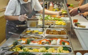 food being served in a cafeteria line